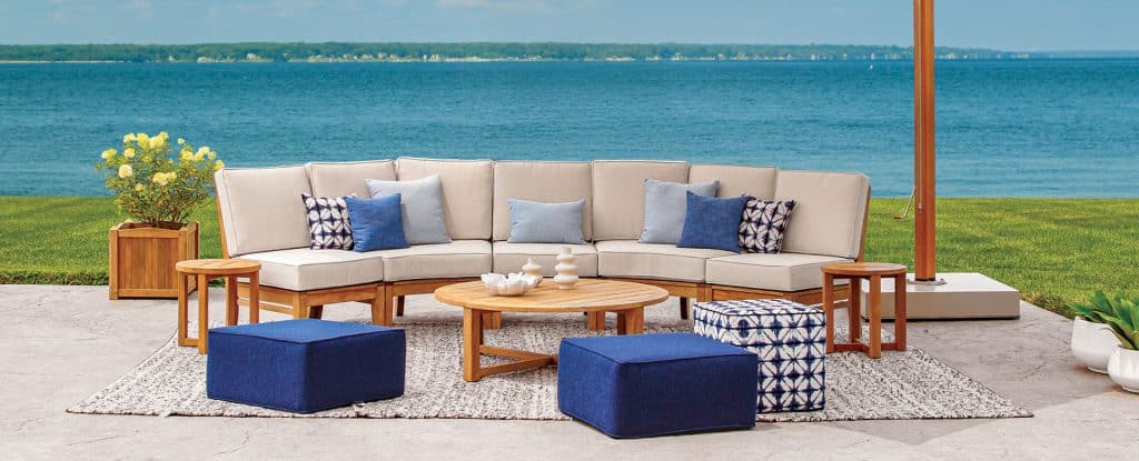 a close up photo of a teak lounge set