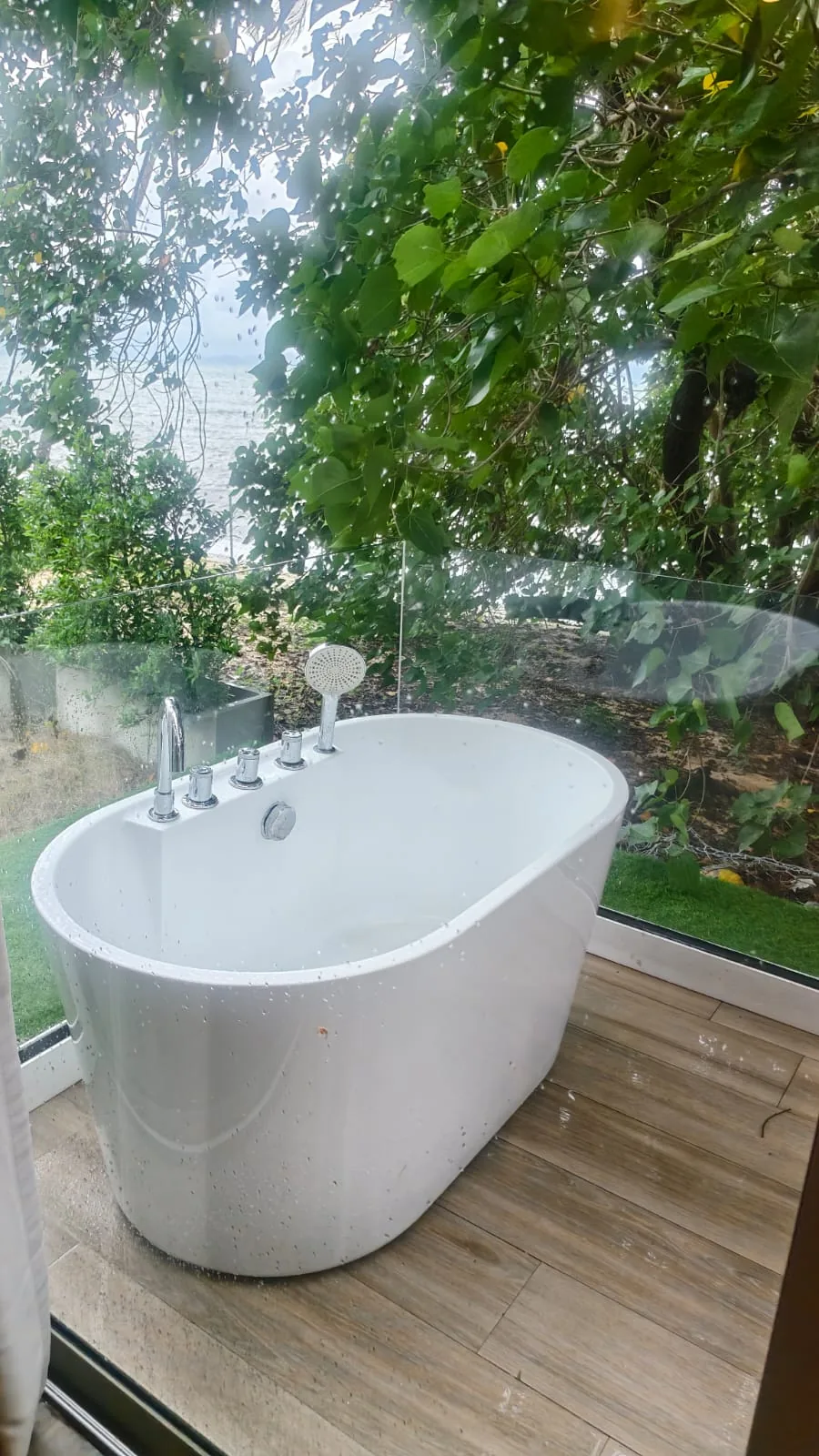 Freestanding bathtub on the private terrace of a ground-floor studio at Anava Samui